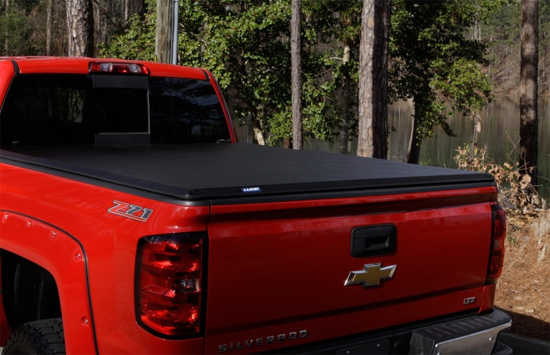 Lund 02-17 Dodge Ram 1500 Fleetside (8ft. Bed) Hard Fold Tonneau Cover - Black